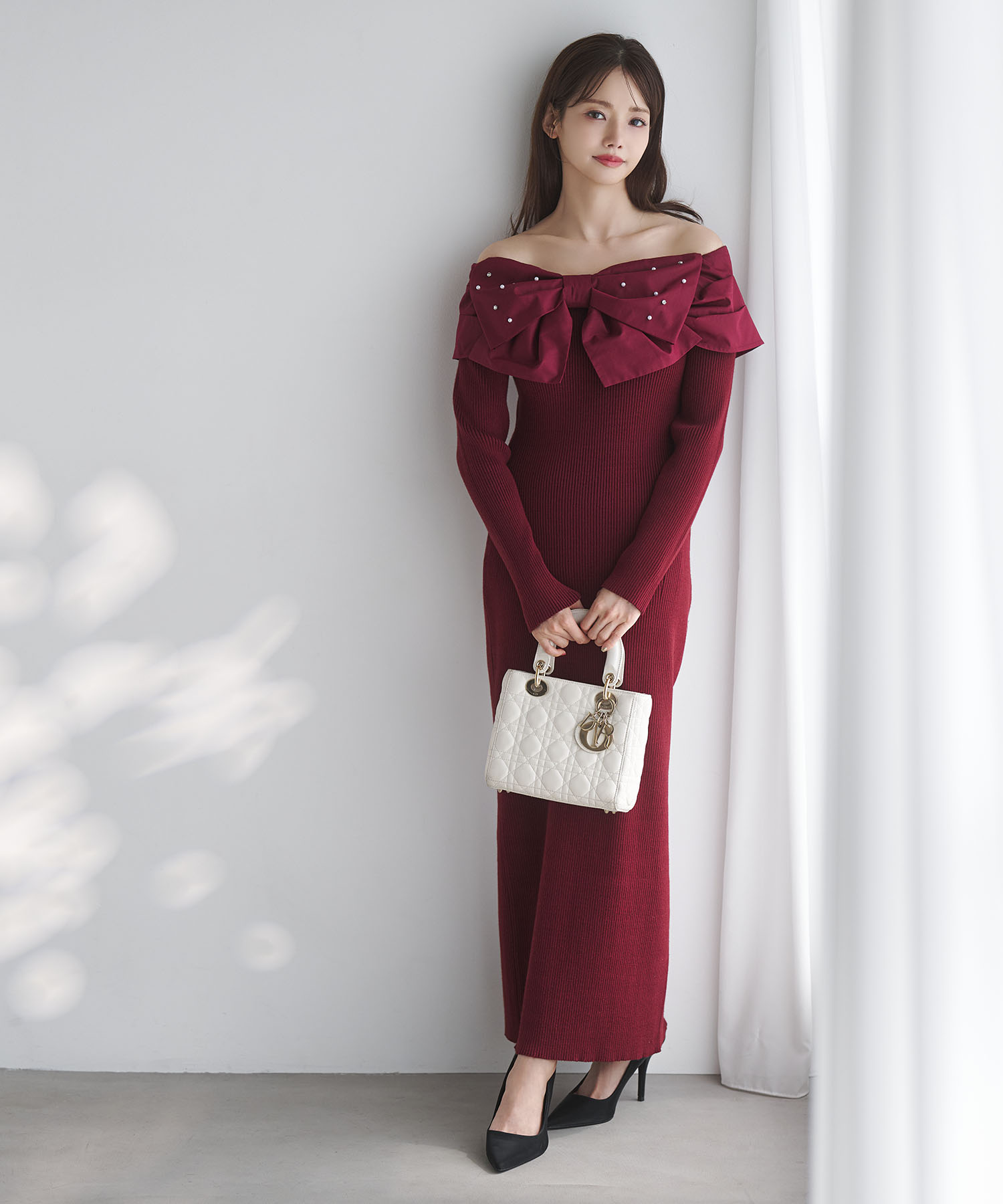 パールビジュー付きビックリボン切り替えリブニットワンピース